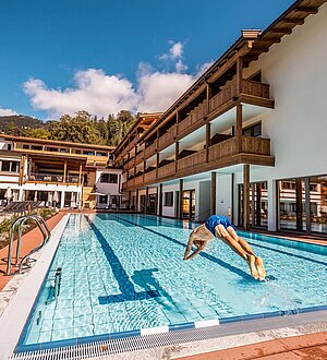 Outdoor pool at Das Bayrischzell Familotel 